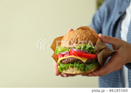 Concept of tasty food with delicious burger Concept of tasty food with delicious burger 86185560