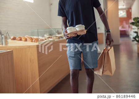 Black man working deliveryman in covid-19 pandemic 86189446