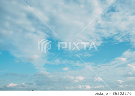 Beautiful white fluffys clouds sky background with blue sky background 86202276