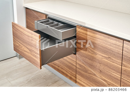 Minimalist style kitchen of walnut wood and gray color with acrylic solid surface countertop Minimalist style kitchen of walnut wood and gray color with acrylic solid surface countertop 86203466