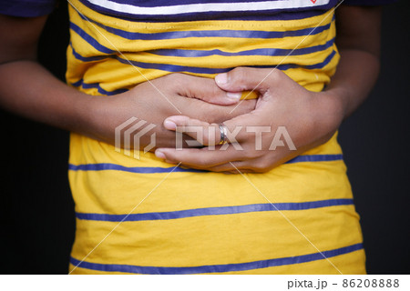 child boy suffering stomach pain close up. child boy suffering stomach pain close up. 86208888