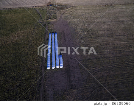 Silo bag, grain storage in La Pampa, Argentina Silo bag, grain storage in La Pampa, Argentina 86209066