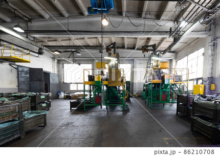 Photo of modern automatic automobile manufacturing workshop. Factory with steel constructions. Plant Photo of modern automatic automobile manufacturing workshop. Factory with steel constructions. Plant 86210708