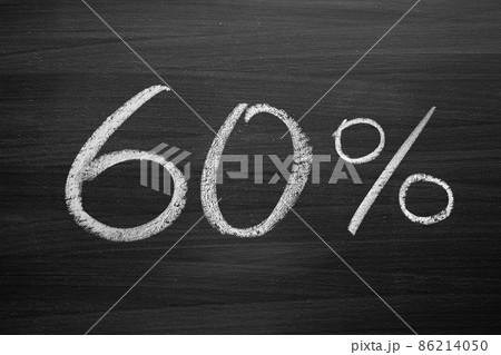 60-percent header written with a chalk on the blackboard 86214050