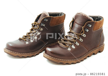 Pair of leather men's shoes isolated on white background 86219381