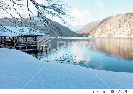 Winter lake in the German alps, snow an sunlight Winter lake in the German alps, snow an sunlight 86220292