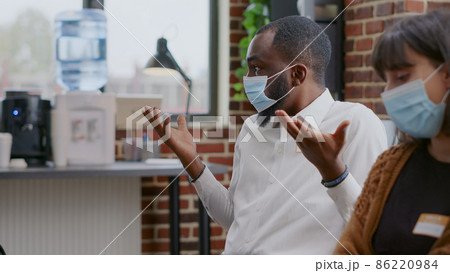 Close up of african american man explaining addiction and mental health problems at aa meeting Close up of african american man explaining addiction and mental health problems at aa meeting 86220984