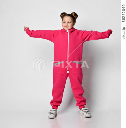 Playful cheerful baby girl in a stylish modern 86222040