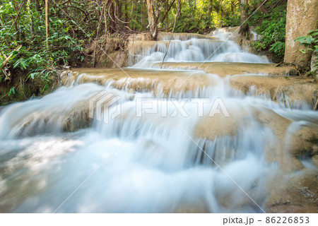 Pu Kang Waterfall in Phan district of Chiang Rai province of Thailand. Beautiful limestone waterfalls in deep jungle of Thailand. Pu Kang Waterfall in Phan district of Chiang Rai province of Thailand. Beautiful limestone waterfalls in deep jungle of Thailand. 86226853