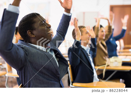 Emotional man listening to speaker at conference 86228044