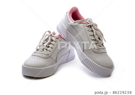 White sports sneakers on a white background White sports sneakers on a white background 86229239