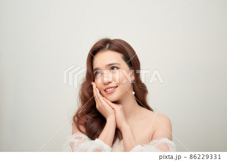Beauty young woman in white dress 86229331