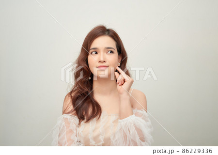 Beautiful woman with perfect makeup on white background 86229336