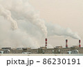 industrial chimneys with heavy white smoke causing air pollution problem 86230191