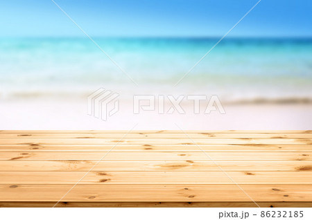 Wood board desk and unforcus Sandy Beach Summer background Wood board desk and unforcus Sandy Beach Summer background 86232185