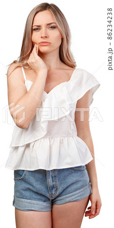 Woman suffering from toothache isolated on white background Woman suffering from toothache isolated on white background 86234238