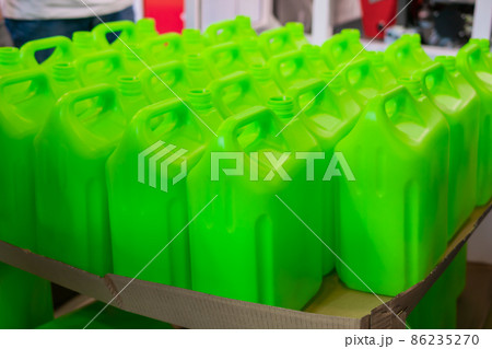 Many empty green plastic jerrycans Many empty green plastic jerrycans 86235270