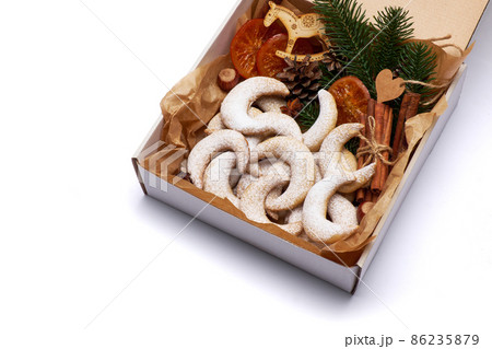 Gift box full of Traditional German or Austrian Vanillekipferl vanilla kipferl cookies Gift box full of Traditional German or Austrian Vanillekipferl vanilla kipferl cookies 86235879