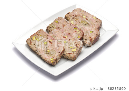Sliced Traditional French terrine covered with bacon isolated on white background 86235890
