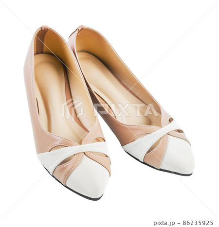 Pair of beige women's shoes isolated on a white background. Pair of beige women's shoes isolated on a white background. 86235925