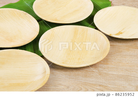 Kitchenware made from dried betel nut leaf palm, natural material. Kitchenware made from dried betel nut leaf palm, natural material. 86235952