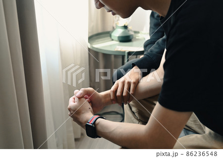 Depressed asian man with psychologist in medical clinic. Depressed asian man with psychologist in medical clinic. 86236548