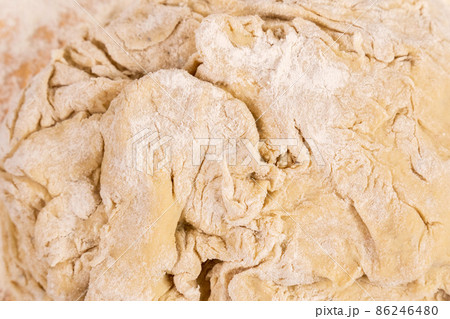 Flour and soft bread dough in bakery, close up, macro, selective focus Flour and soft bread dough in bakery, close up, macro, selective focus 86246480