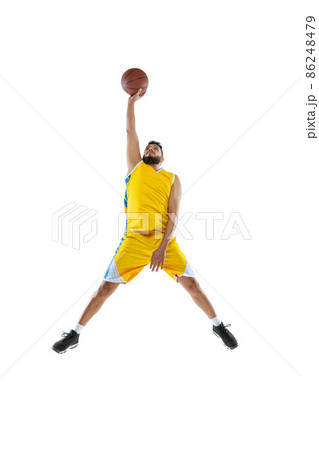 One professional basketball player practicing isolated on white studio background. Sport, motion, activity, movement concepts. 86248479