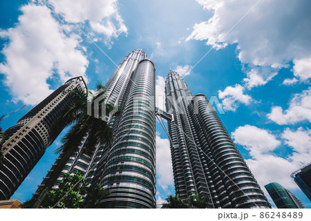 Modern skyscrapers under cloudy sky 86248489