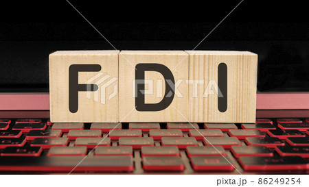 FDI a word on wooden cubes on the illuminated laptop keyboard FDI a word on wooden cubes on the illuminated laptop keyboard 86249254