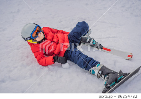 Child skiing in mountains. Active toddler kid with safety helmet, goggles and poles. Ski race for young children. Winter sport for family. Kids ski lesson in alpine school. Little skier racing in snow Child skiing in mountains. Active toddler kid with safety helmet, goggles and poles. Ski race for young children. Winter sport for family. Kids ski lesson in alpine school. Little skier racing in snow 86254732