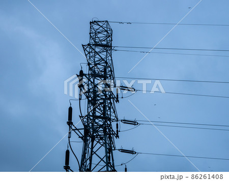 Power lines on background of blue sky Power lines on background of blue sky 86261408