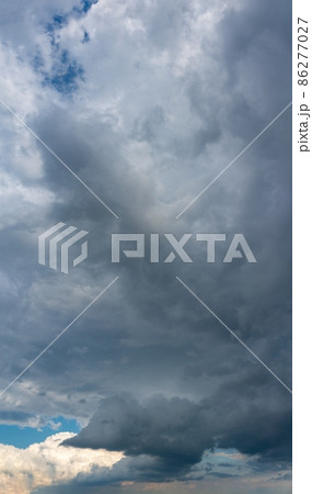 Fantastic clouds at sunrise, vertical panorama Fantastic clouds at sunrise, vertical panorama 86277027