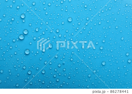 Water drops on light blue background, top view 86278441