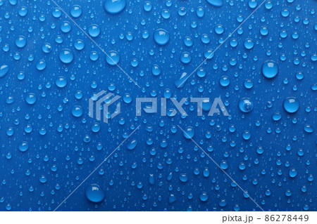 Water drops on blue background, top view Water drops on blue background, top view 86278449