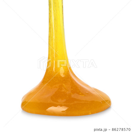 Flowing orange slime on white background. Antistress toy Flowing orange slime on white background. Antistress toy 86278570