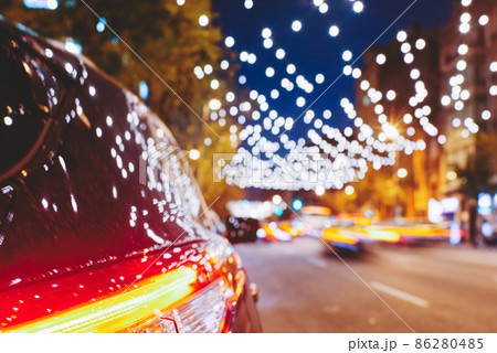 Modern car on city road at night 86280485