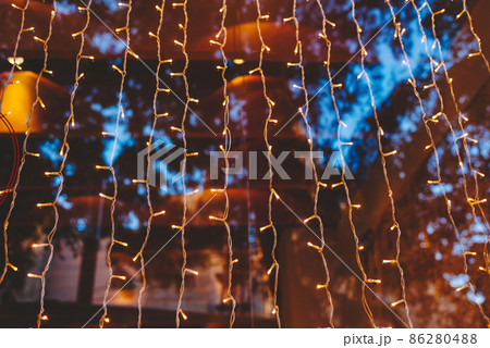 Christmas string lights on window 86280488