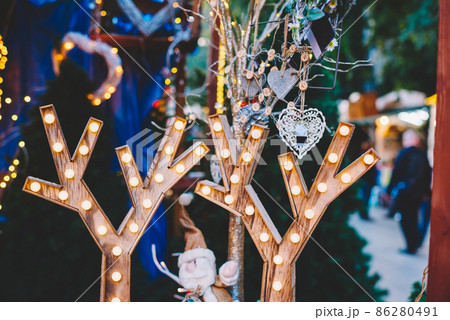 Reindeer antlers with lights on Christmas outdoor market 86280491