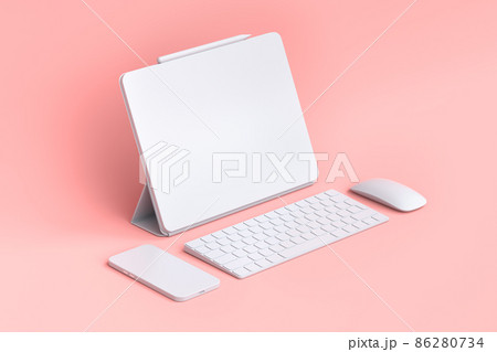Computer tablet with keyboard, mouse and phone isolated on pink background. 86280734