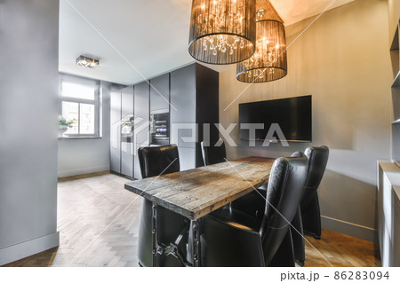 Dining room interior in modern urban appartment Dining room interior in modern urban appartment 86283094