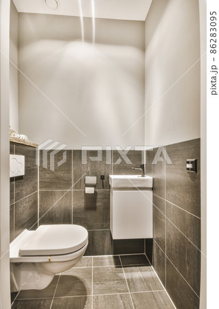 Interior of small clean restroom in miniature style 86283095