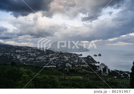 View of the city of Gurzuf and Mount Ayu-Dag bear in Crimea on the Black Sea coast 86291967