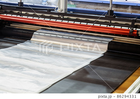 industrial machine with newly made transparent plastic film industrial machine with newly made transparent plastic film 86294331