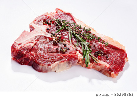 raw porterhouse beef steak on a white background raw porterhouse beef steak on a white background 86298863