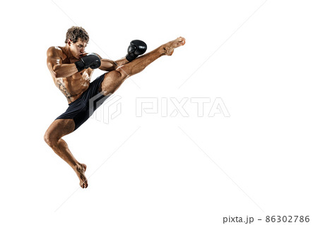 professional muscular boxer in jump isolated on white studio background. Sport, competition concept 86302786