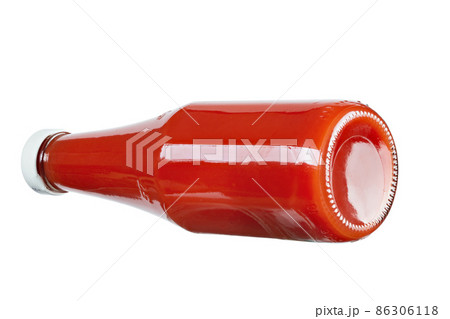 Glass bottle of ketchup on isolated white background. Tomato ketchup bottle. Glass bottle of ketchup on isolated white background. Tomato ketchup bottle. 86306118