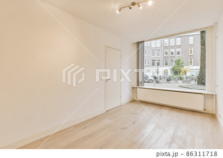 Mind-blowing room with a large window in a luxury home 86311718