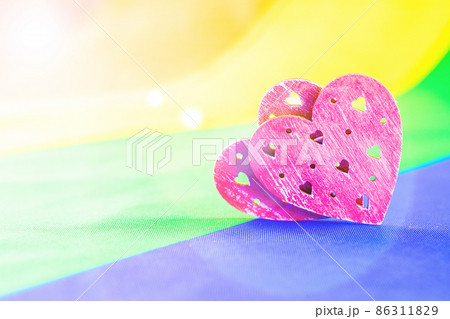 Hearts background homosexual lesbian concept. Two hearts lgbtq, gay, transgender love symbol. LGBT pride day celebration. 86311829
