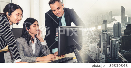 Business people wearing headset working in office broaden view 86330348